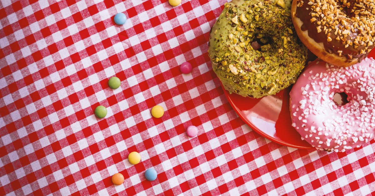 'Lighter' version of American breakfast - Three Donuts on Plate