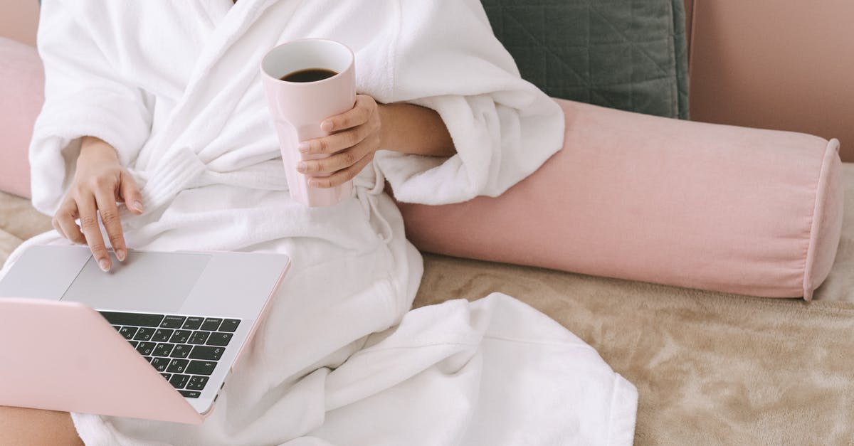 A cup of cilantro? - Woman in White Robe Holding White Ceramic Mug A cup of cilantro? - Woman in White Robe Holding White Ceramic Mug