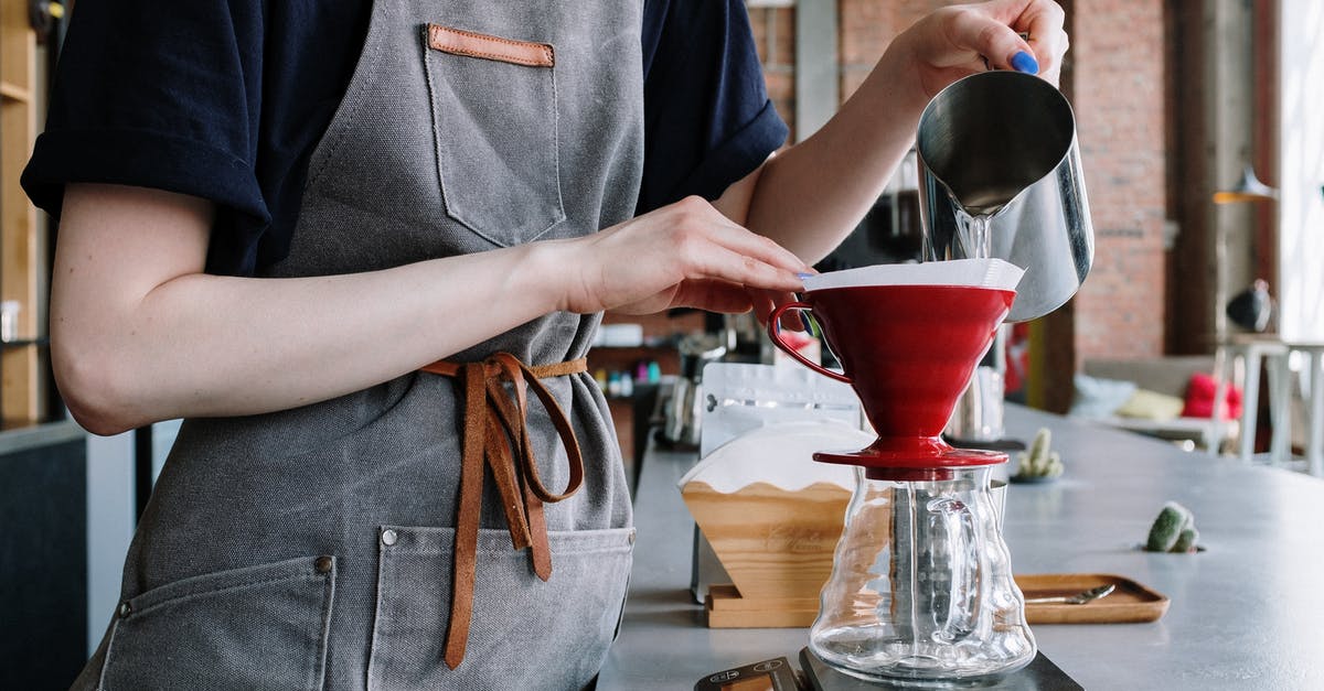 A strange problem with BWT Initium 2.5 l filter's scale - Person in Gray Apron Holding Red Ceramic Bowl A strange problem with BWT Initium 2.5 l filter's scale - Person in Gray Apron Holding Red Ceramic Bowl