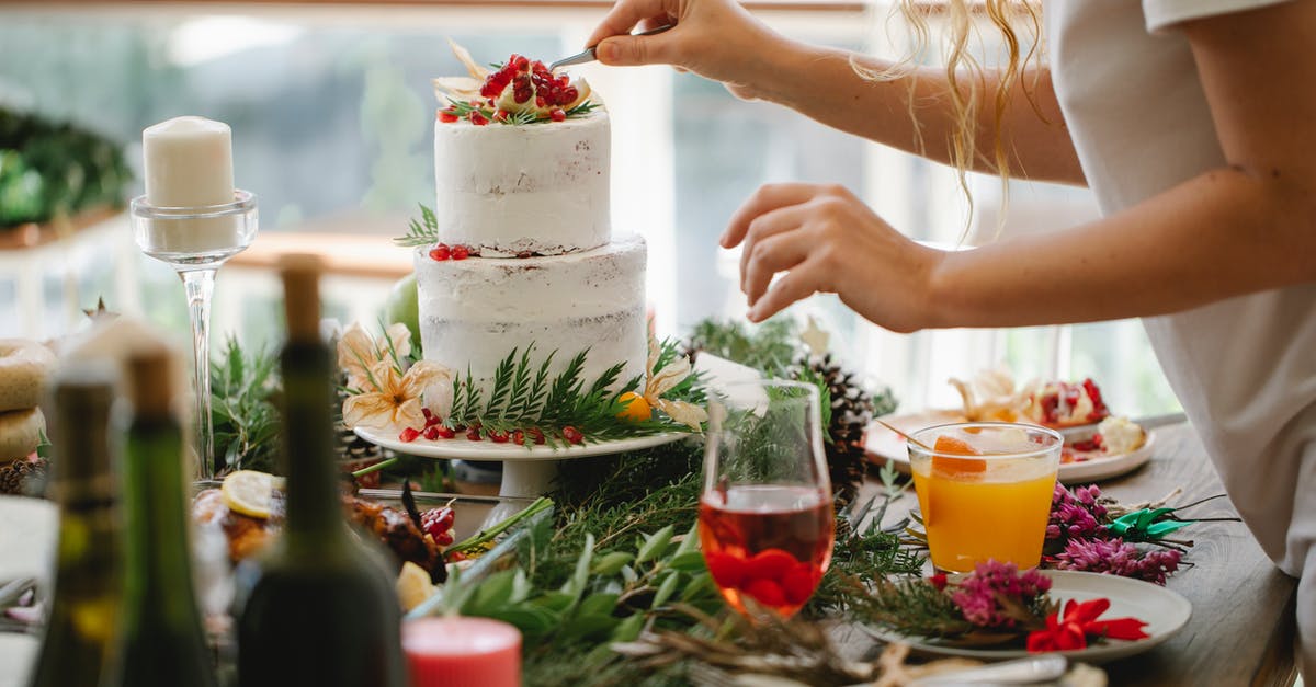 Add sugar to Taco Seasoning? - Crop anonymous female chef in casual clothes standing at table with various dishes and drinks and putting berries on top of delicious cake Add sugar to Taco Seasoning? - Crop anonymous female chef in casual clothes standing at table with various dishes and drinks and putting berries on top of delicious cake