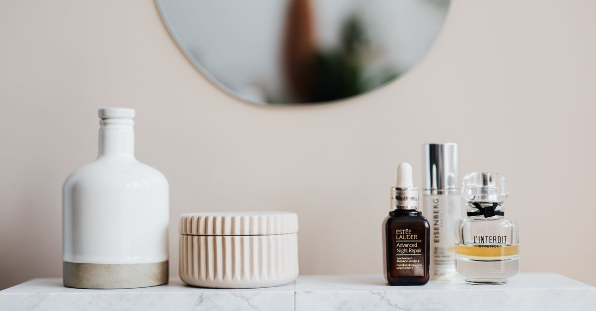 Adjusting whipped cream to hold its shape longer? - Various beauty products on ceramic shelf in bathroom Adjusting whipped cream to hold its shape longer? - Various beauty products on ceramic shelf in bathroom