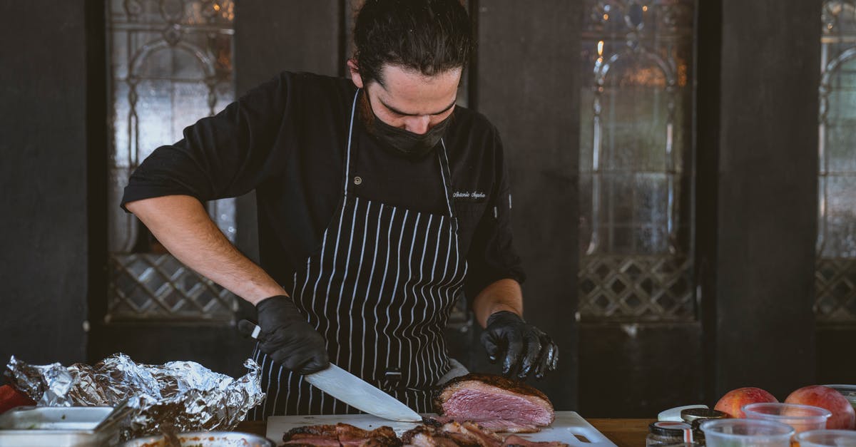 Advice on meat cuts for German rouladen - Man Wearing an Apron Cutting a Streak Advice on meat cuts for German rouladen - Man Wearing an Apron Cutting a Streak