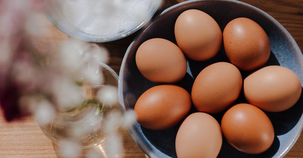 After full reseasoning of my cast iron, eggs are still sticking - Bowl Full of Eggs on Kitchen Table After full reseasoning of my cast iron, eggs are still sticking - Bowl Full of Eggs on Kitchen Table
