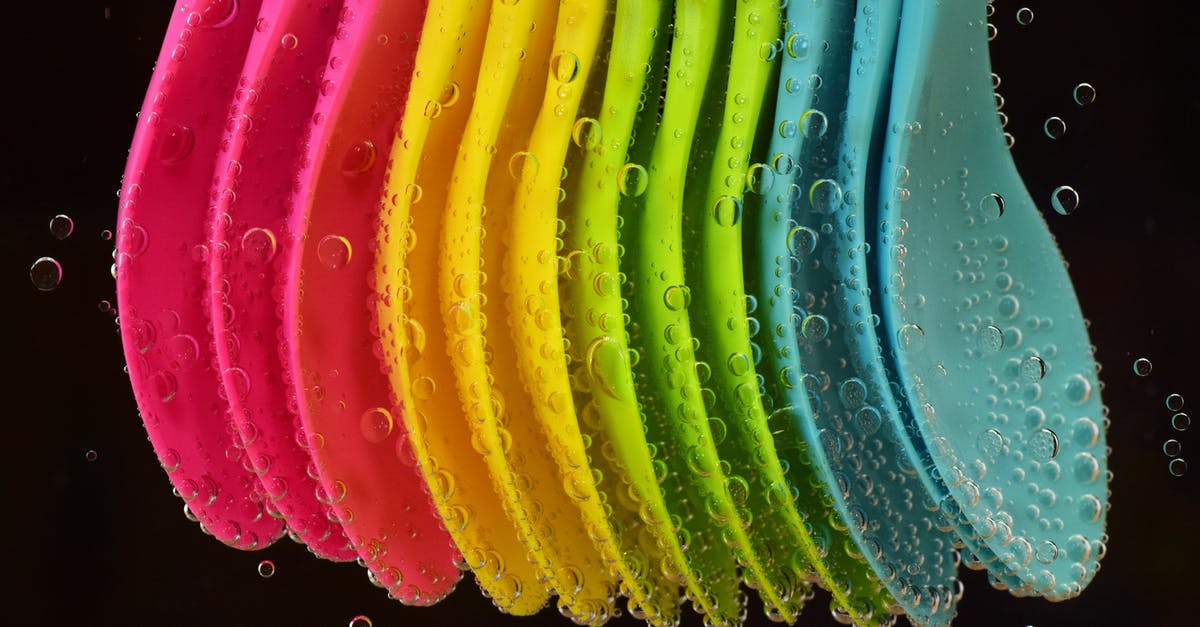 Air bubbles in semi liquid chicken sausage - Assorted-color Spoon Lot in Water