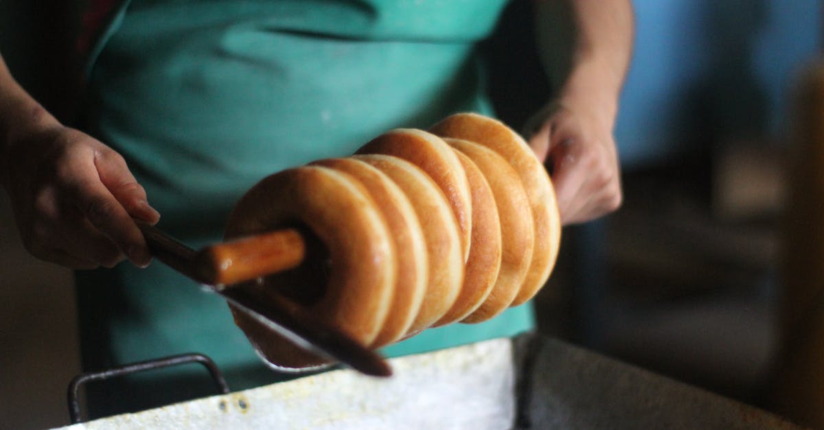 airy bread rolls done in bread machine - Person Holding Cooked Rolls of Bread airy bread rolls done in bread machine - Person Holding Cooked Rolls of Bread