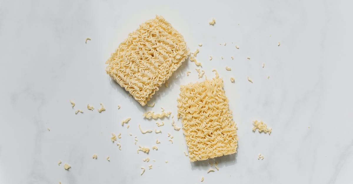 Alkaline ramen noodles shelf life in uncooked state - Photo of Uncooked Noodles on White Background Alkaline ramen noodles shelf life in uncooked state - Photo of Uncooked Noodles on White Background