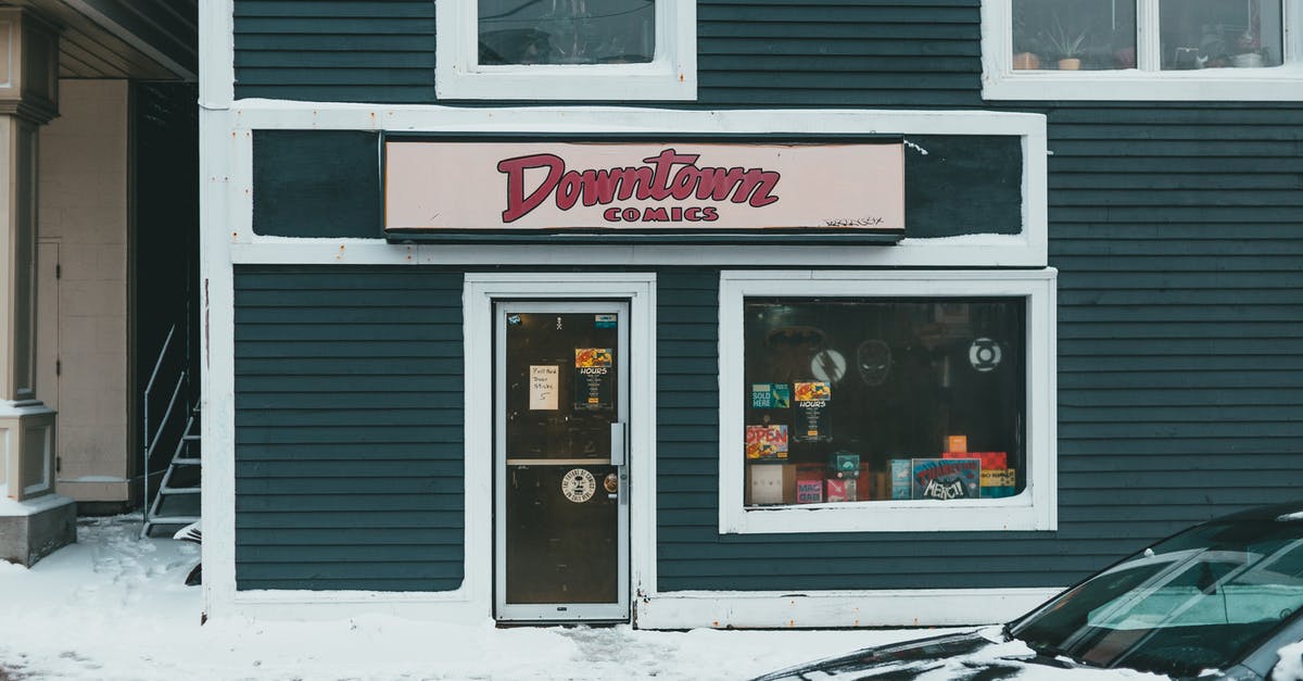 All the cold pressed virgin sunflower oil in shop is in transparent bottles. Does it mean it is already rancid? - Comic book shop exterior with entrance door and window against snowy pavement and automobile in town All the cold pressed virgin sunflower oil in shop is in transparent bottles. Does it mean it is already rancid? - Comic book shop exterior with entrance door and window against snowy pavement and automobile in town