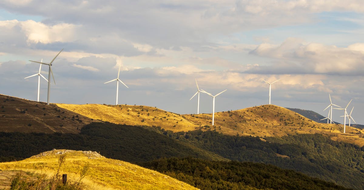 Alternative to Marsala? - White Wind Turbines on Green Grass Field Under White Clouds and Blue Sky Alternative to Marsala? - White Wind Turbines on Green Grass Field Under White Clouds and Blue Sky
