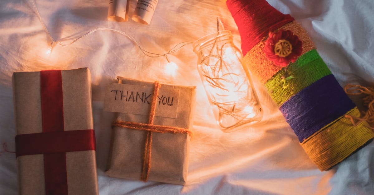 Aluminized Paper Wrapper Sides - Gifts in paper wrapper on table Aluminized Paper Wrapper Sides - Gifts in paper wrapper on table