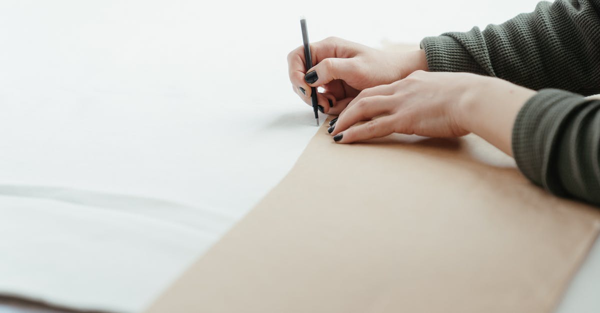 Am I missing out on something by not using parchment paper? - Person Writing on White Paper Am I missing out on something by not using parchment paper? - Person Writing on White Paper