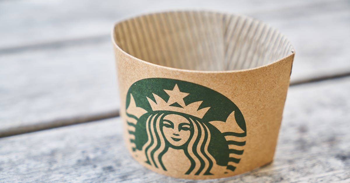 Amount of caffeine per bean of Starbucks bagged coffee (big secret I guess) [closed] - Brown Starbucks Paper on Gray Wooden Surface