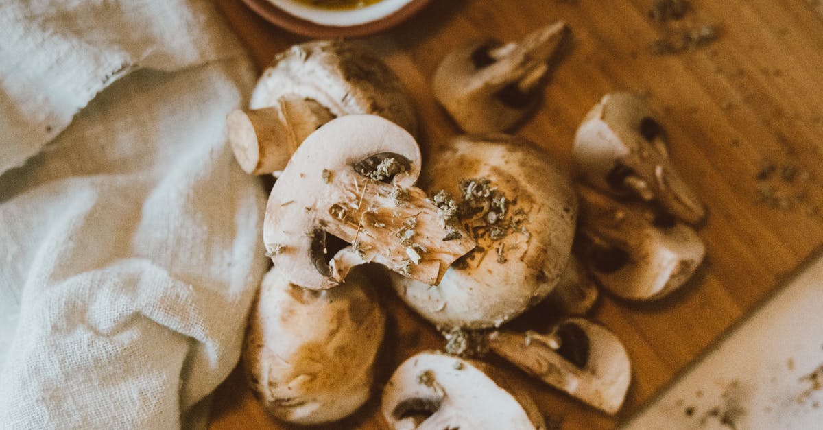 Appropriate way to thaw mushrooms - Brown and White Mushrooms on Brown Wooden Table Appropriate way to thaw mushrooms - Brown and White Mushrooms on Brown Wooden Table