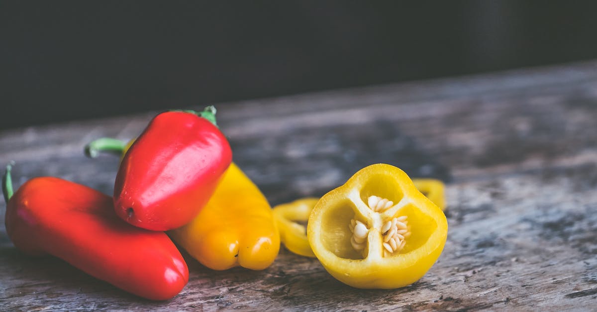 Are bell peppers with brown seeds safe to eat? - Bell Peppers on Gray Table Are bell peppers with brown seeds safe to eat? - Bell Peppers on Gray Table