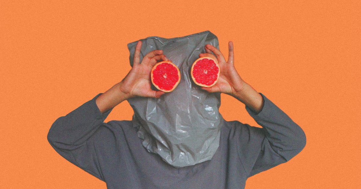 Are garbage cans food safe, or made of food grade plastic? - Person Covered With Plastic Bag on Head While Holding Sliced Blood Orange Are garbage cans food safe, or made of food grade plastic? - Person Covered With Plastic Bag on Head While Holding Sliced Blood Orange