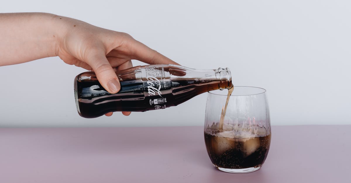 Are ice tea in bottles considered as carbonated drinks like coke? - Photo Of Person Pouring Soft Drinks On Glass Are ice tea in bottles considered as carbonated drinks like coke? - Photo Of Person Pouring Soft Drinks On Glass