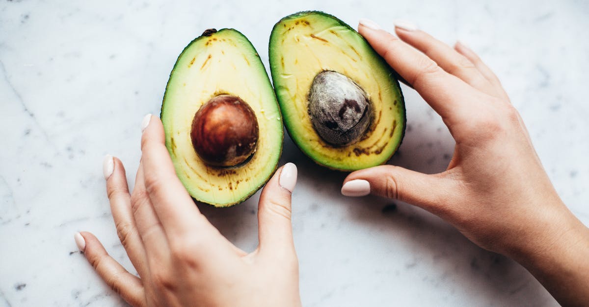 Are nectarine seeds edible? - Person Holding Sliced Avocado Are nectarine seeds edible? - Person Holding Sliced Avocado