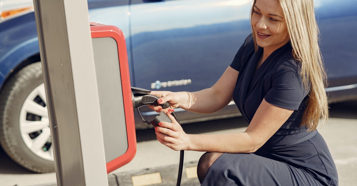 Are Pyrex casserole dishes safe for use on electric stovetops? - Side view of positive female in casual dress sitting near station on street charging electric vehicle for continuation trip Are Pyrex casserole dishes safe for use on electric stovetops? - Side view of positive female in casual dress sitting near station on street charging electric vehicle for continuation trip