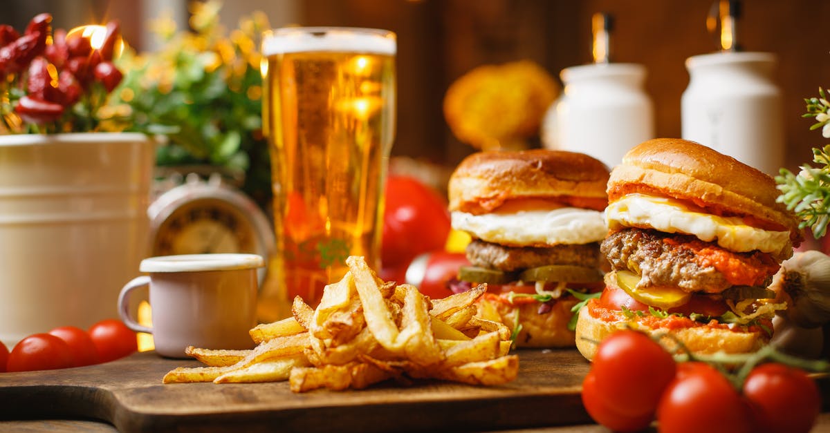 Are rare burgers safe? - Burger and Fries on Brown Wooden Table Are rare burgers safe? - Burger and Fries on Brown Wooden Table