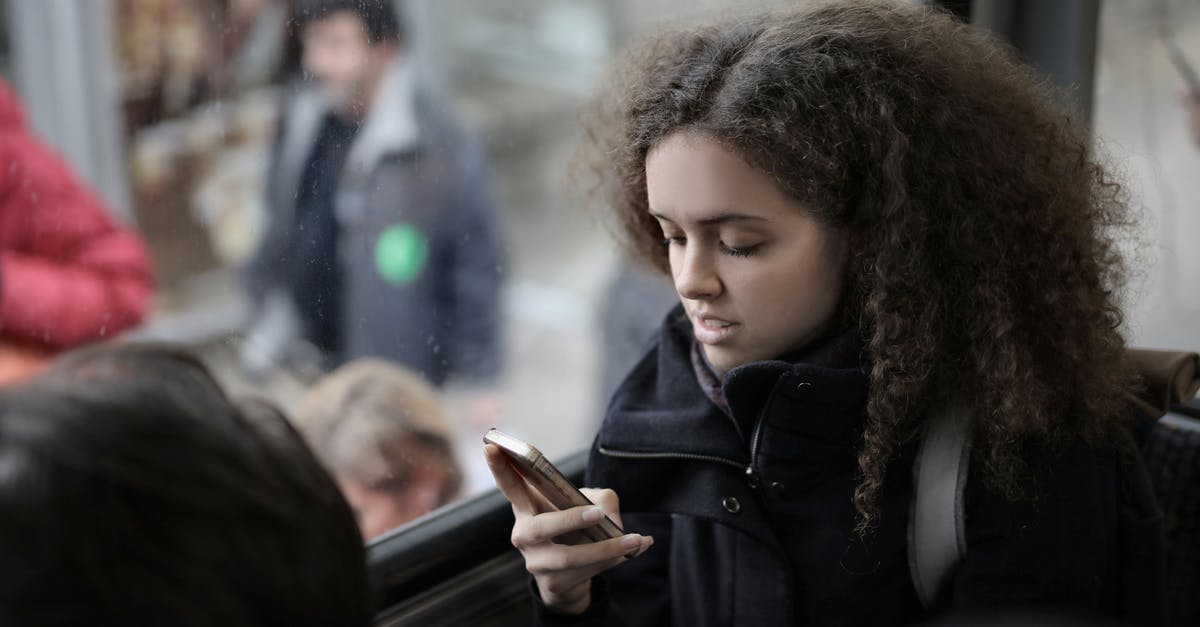 Are residues from seasoning coating harmful when using carbon steel pan? - From above view of serious young female traveler with backpack sitting on passenger seat in bus near window and browsing smartphone Are residues from seasoning coating harmful when using carbon steel pan? - From above view of serious young female traveler with backpack sitting on passenger seat in bus near window and browsing smartphone