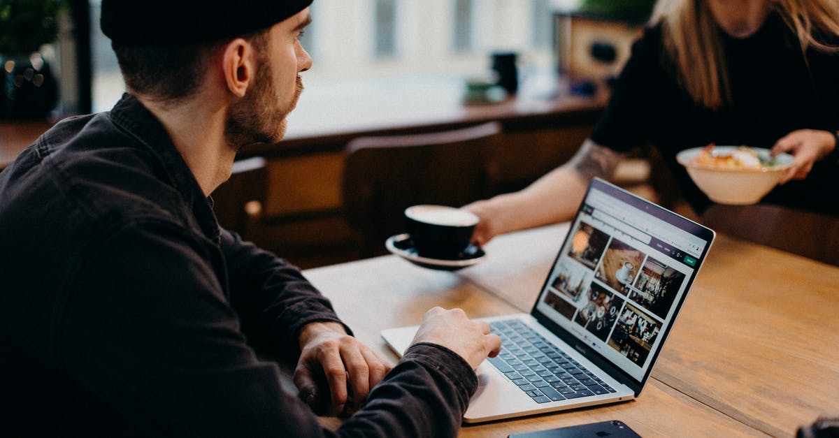Are there accurate meat scales which interface easily with a computer? - Man Wearing Black Jacket Using Laptop Computer Sitting Beside Table