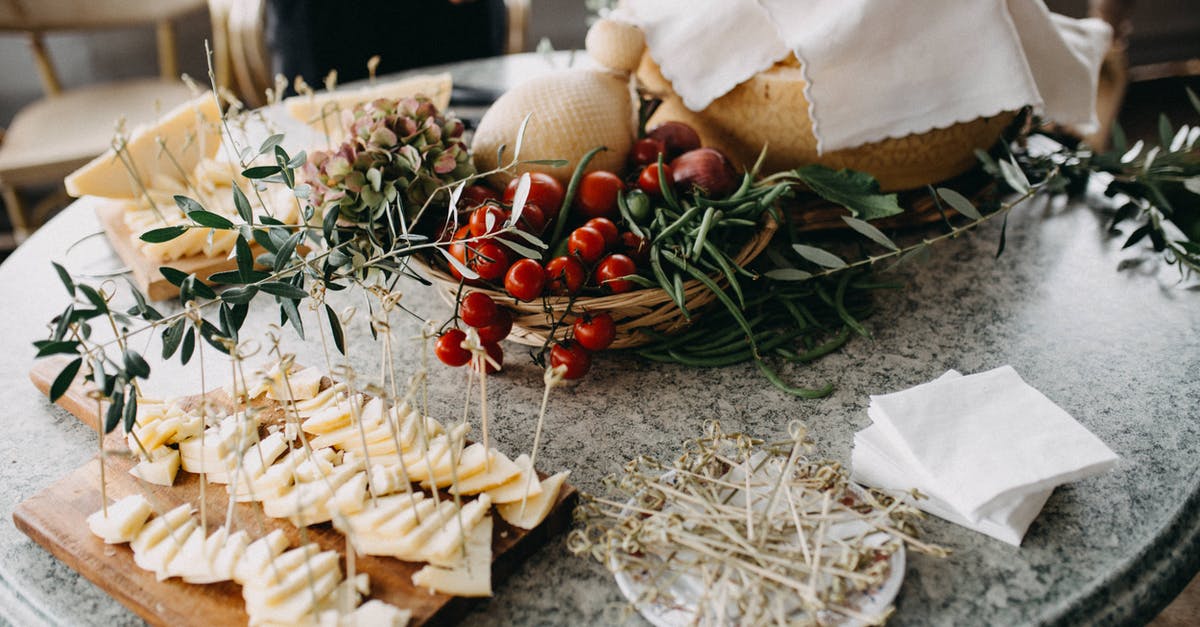 Are there cheeses with less saturated fat? - Finger Foods On Top Of A Grey Marble Table Are there cheeses with less saturated fat? - Finger Foods On Top Of A Grey Marble Table