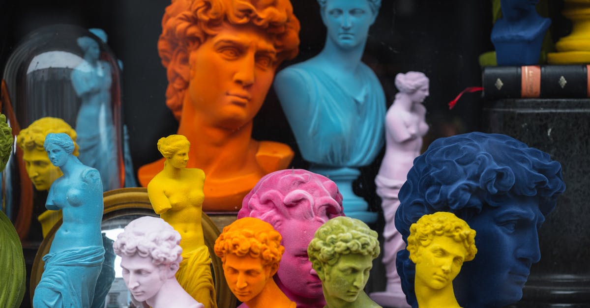 Are there different styles of tahini? - Multicolored head sculptures of David near bright statuettes placed in store with abundance of souvenirs and black pillar with book Are there different styles of tahini? - Multicolored head sculptures of David near bright statuettes placed in store with abundance of souvenirs and black pillar with book