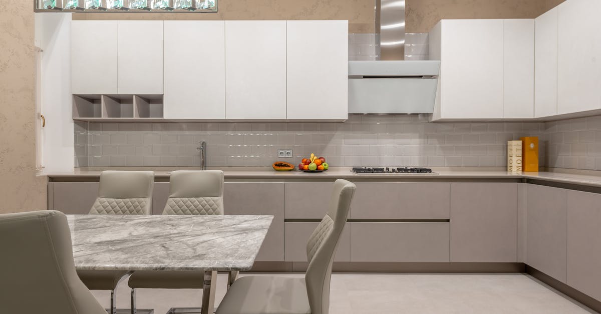 Are there pressure-cooker specific foods? - Interior of kitchen with table Are there pressure-cooker specific foods? - Interior of kitchen with table