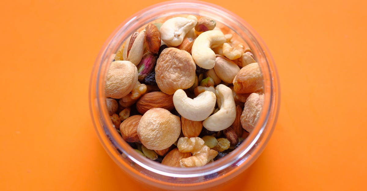 Are these cashew nuts mouldy? - Brown and White Stones in Clear Glass Bowl Are these cashew nuts mouldy? - Brown and White Stones in Clear Glass Bowl