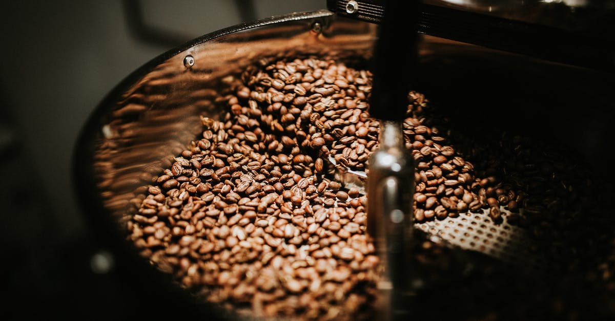 Are these coffee beans unroasted? - Shallow Focus Photo of Coffee Beans Are these coffee beans unroasted? - Shallow Focus Photo of Coffee Beans