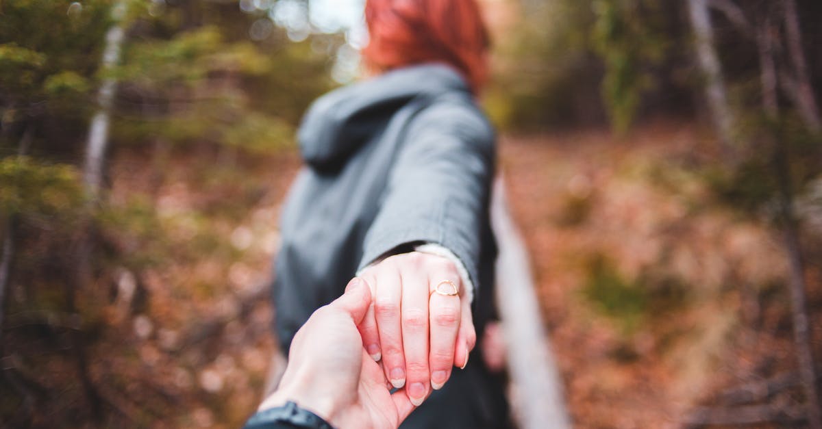 Are trace amounts of lead in seasoned bakeware safe? - Faceless woman leading boyfriend through autumn forest