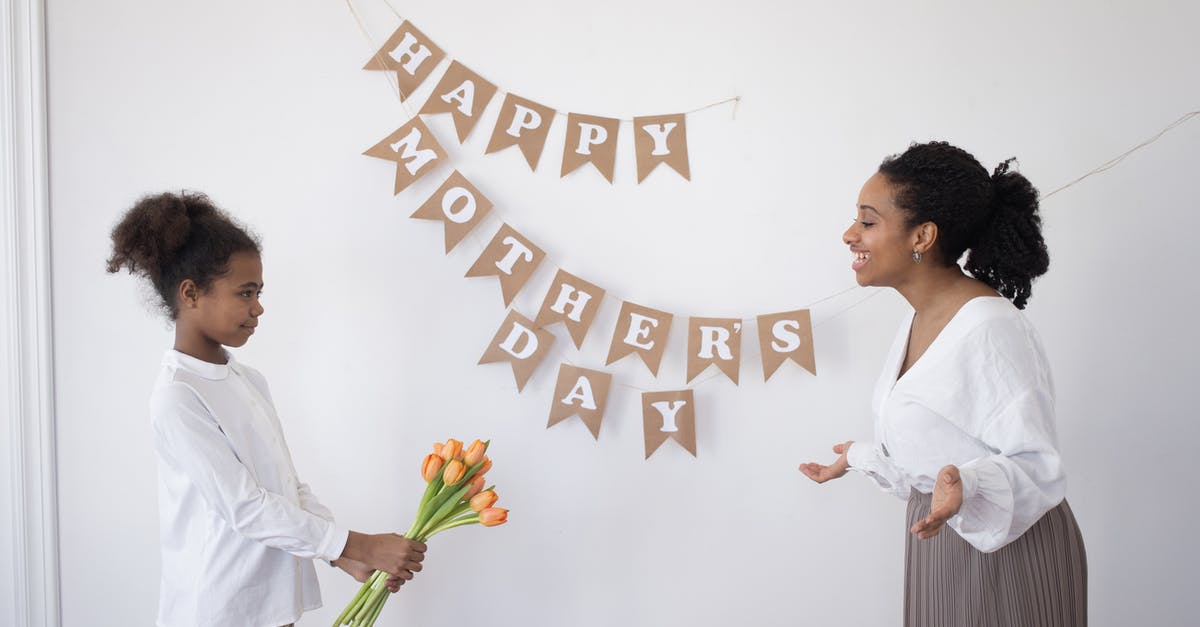 Are tulips edible? - A Girl Holding a Bunch of Tulips Near a Banner Are tulips edible? - A Girl Holding a Bunch of Tulips Near a Banner