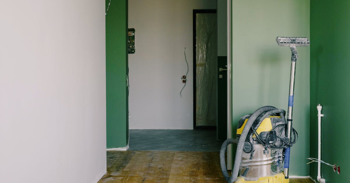 Are vacuum pump effective to improve wine conservation? - Industrial vacuum cleaner placed on dirty parquet in room with green walls and doorway in spacious apartment during repair works Are vacuum pump effective to improve wine conservation? - Industrial vacuum cleaner placed on dirty parquet in room with green walls and doorway in spacious apartment during repair works