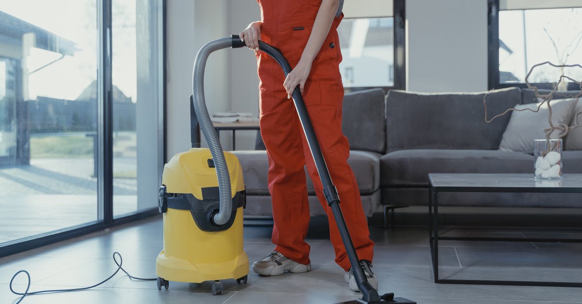 Are vacuum pump effective to improve wine conservation? - Person Vacuuming the Floor Are vacuum pump effective to improve wine conservation? - Person Vacuuming the Floor