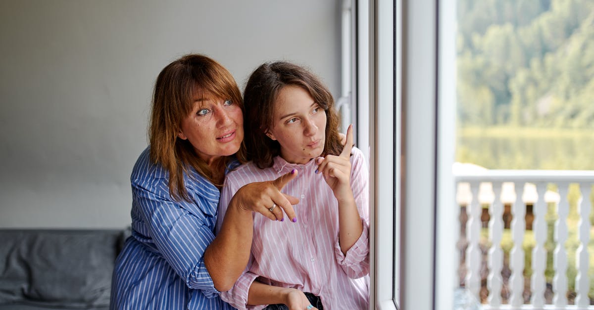 At what point should carrots be thrown away? - Women carefully looking out window together At what point should carrots be thrown away? - Women carefully looking out window together