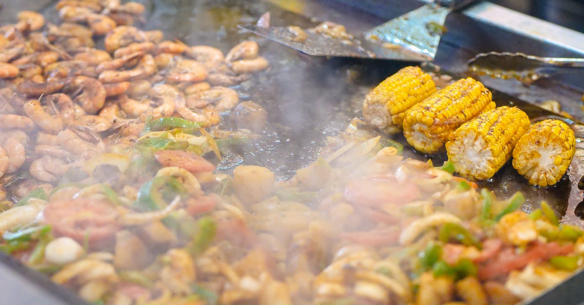 Attempted deep frying smoke fiasco - Seafood and Corn Frying on Stainless Surface Attempted deep frying smoke fiasco - Seafood and Corn Frying on Stainless Surface