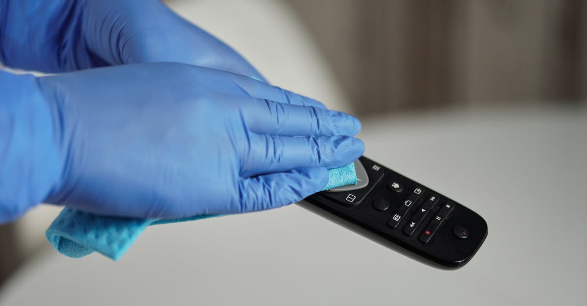 Avoiding foodborne botulism - Person Holding Black Remote Control Avoiding foodborne botulism - Person Holding Black Remote Control