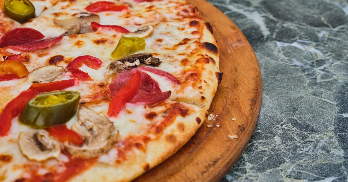 Bake frozen pizza without a tray - will it melt and drip? - Pizza on Wooden Tray Bake frozen pizza without a tray - will it melt and drip? - Pizza on Wooden Tray