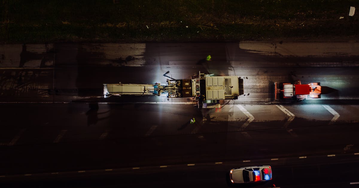 Baked eggplant is bitter - is there a way to fix it? - Top view of specialized vehicles with lights on repairing road and laying asphalt and concrete at night Baked eggplant is bitter - is there a way to fix it? - Top view of specialized vehicles with lights on repairing road and laying asphalt and concrete at night