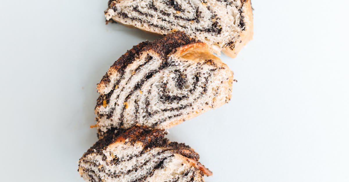Baked Raisin Cinnamon Bread and shipping - Slices of Cinnamon Swirl Bread in Close-up Baked Raisin Cinnamon Bread and shipping - Slices of Cinnamon Swirl Bread in Close-up