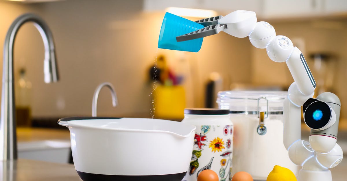 Baking a Pie in a Stainless Steel - White Ceramic Bowl With Yellow Fruits Baking a Pie in a Stainless Steel - White Ceramic Bowl With Yellow Fruits