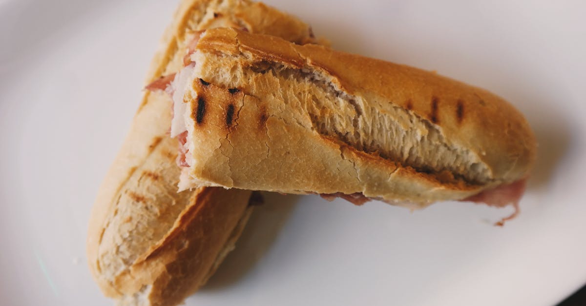 Baking baguettes - Flat Lay Photography of Bread Served in White Tray Baking baguettes - Flat Lay Photography of Bread Served in White Tray