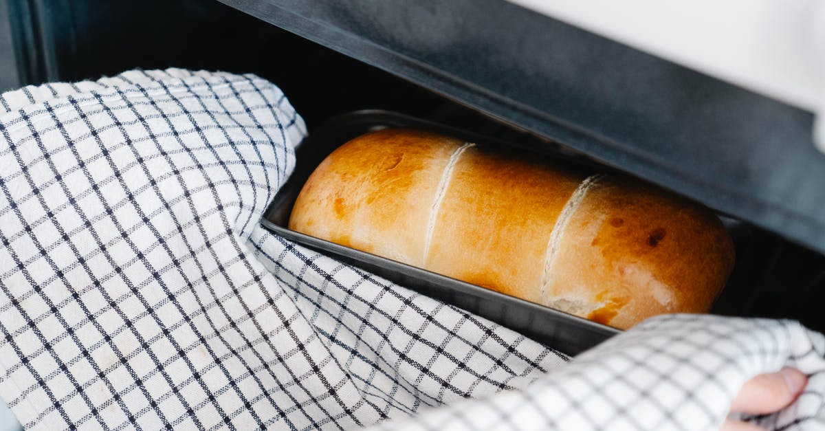 Baking Bread in a Dutch Oven - Close-Up Shot of a Person Baking a Bread Baking Bread in a Dutch Oven - Close-Up Shot of a Person Baking a Bread