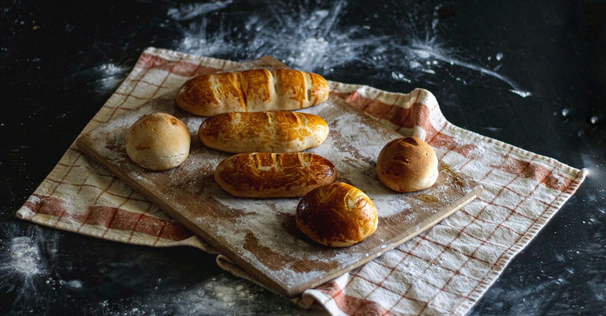 Baking bread without yeast - Brown Bread on Wooden Tray Baking bread without yeast - Brown Bread on Wooden Tray