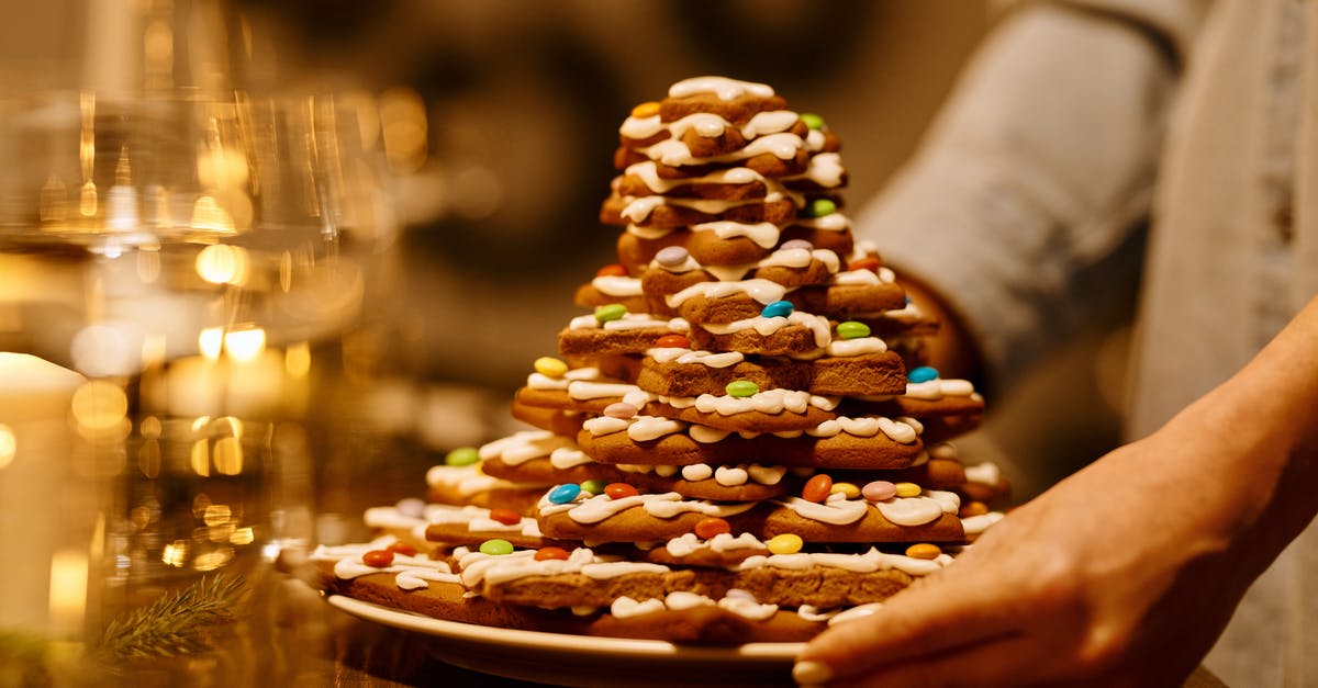 Baking lots of bread - keeping a yeast starter - Person Serving a Stack of Biscuits on a Plate Baking lots of bread - keeping a yeast starter - Person Serving a Stack of Biscuits on a Plate