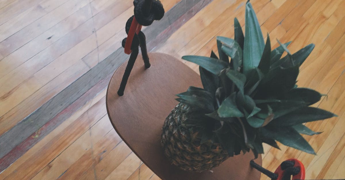 Bamboo Cutting board - Pineapple on Brown Wooden Rack
