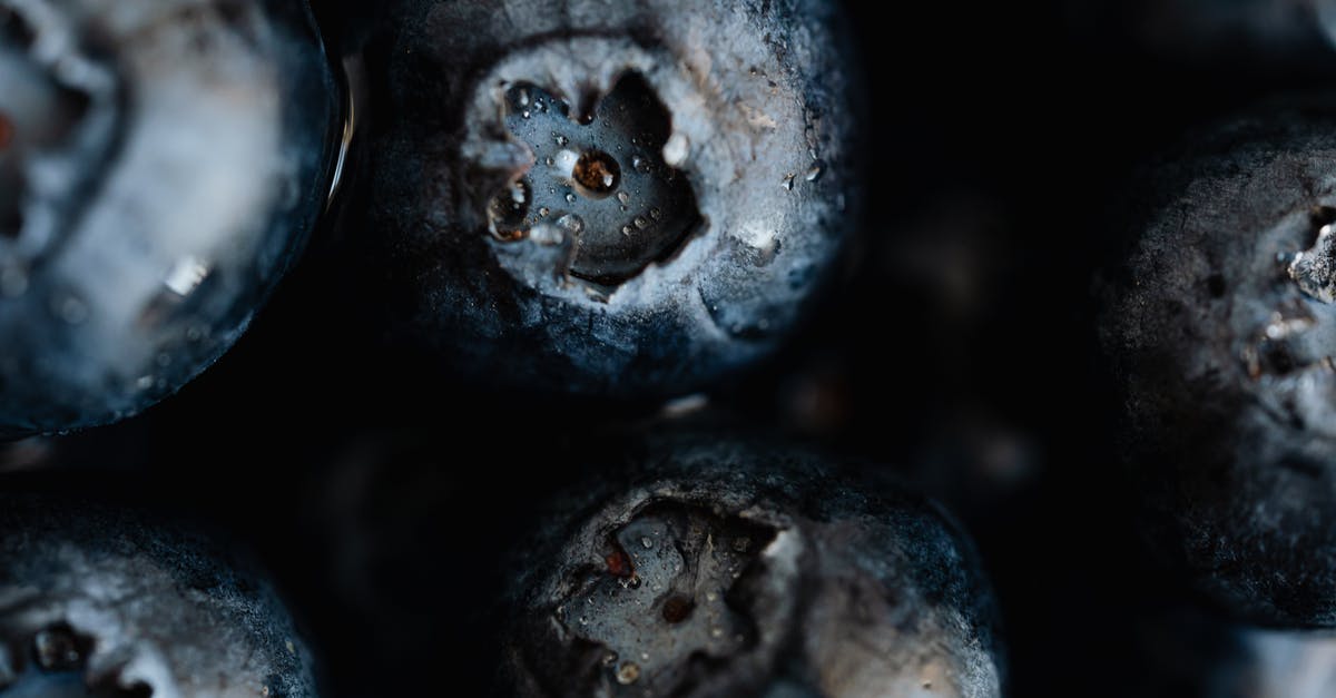 Bananas are radioactive...so how many exactly would you have eat to die? Is it possible to calculate? [closed] - Closeup delicious ripe and fresh blueberry with drops of water on market stall