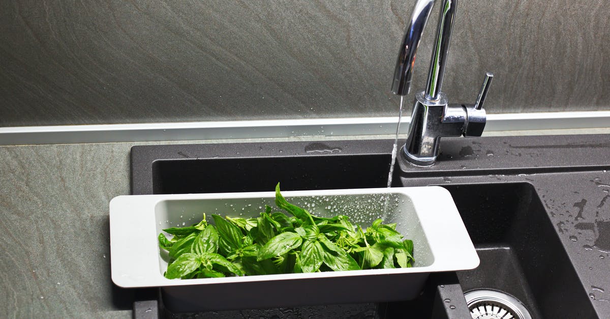 Basil - to wash or not to wash? Best practices? - Sink strainer with green basil Basil - to wash or not to wash? Best practices? - Sink strainer with green basil