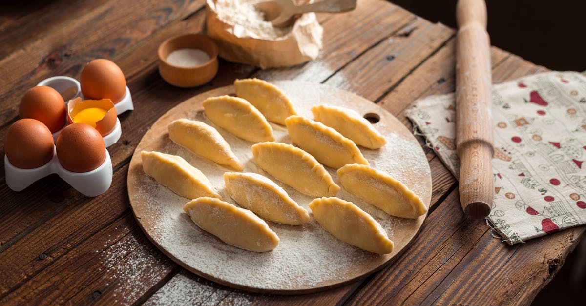 Beating Egg Whites with Granulated Sugar Added for Tapioca Pudding - Pastries on Wooden Tray