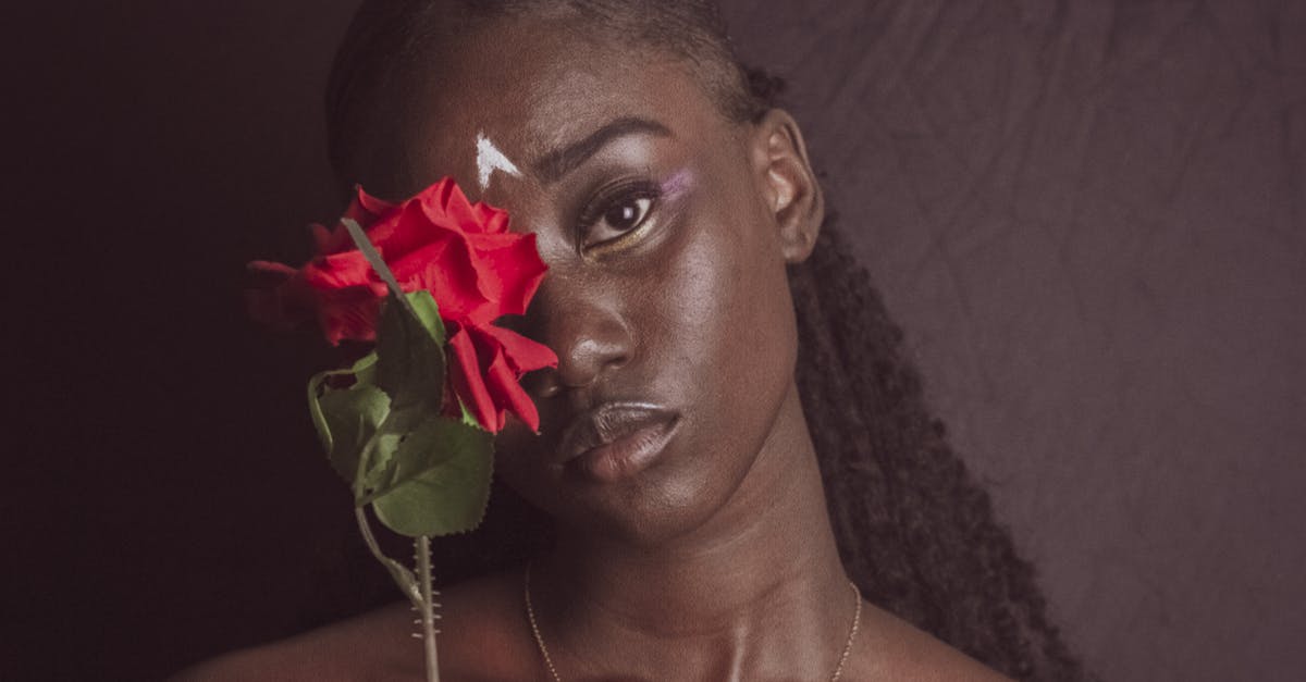 Beef: Red on the outside, brown on the inside - Happy black woman with flower Beef: Red on the outside, brown on the inside - Happy black woman with flower
