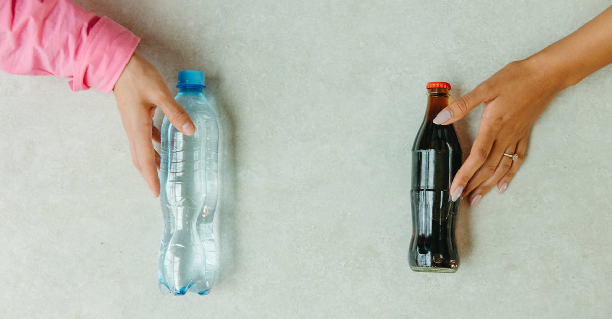 Beer instead of Seltzer in tempura? - Clear Glass Bottle on White Table Beer instead of Seltzer in tempura? - Clear Glass Bottle on White Table